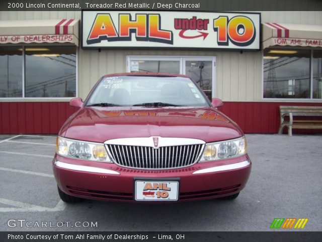 2000 Lincoln Continental  in Toreador Red Metallic