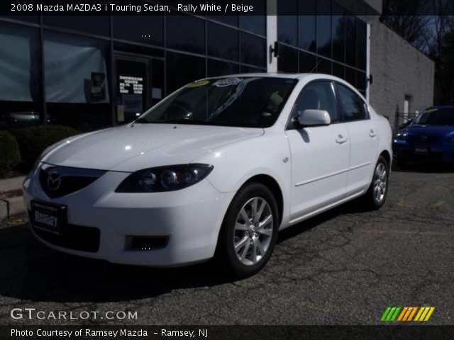 2008 Mazda MAZDA3 i Touring Sedan in Rally White