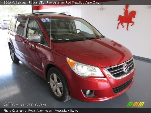2009 Volkswagen Routan SEL in Pomegranate Red Metallic
