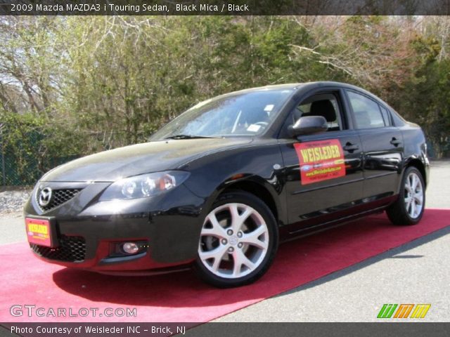 2009 Mazda MAZDA3 i Touring Sedan in Black Mica