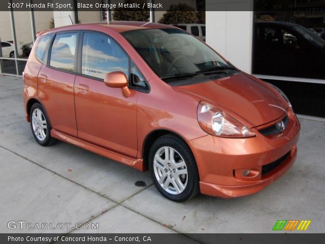 Orange honda fit sport