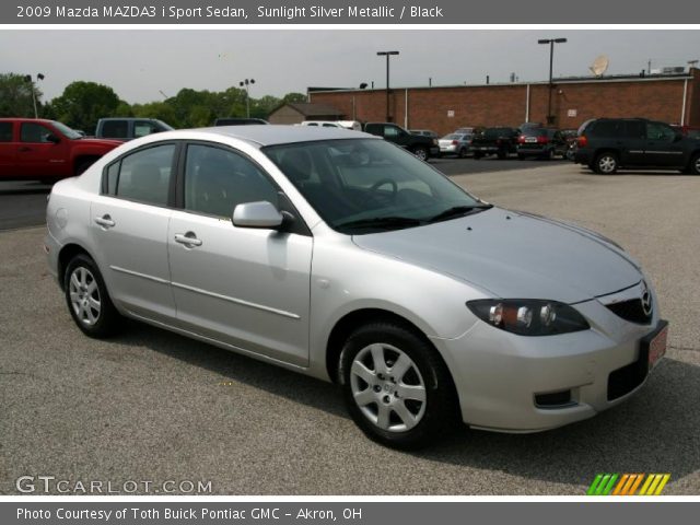 2009 Mazda MAZDA3 i Sport Sedan in Sunlight Silver Metallic