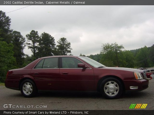2002 Cadillac DeVille Sedan in Cabernet Metallic