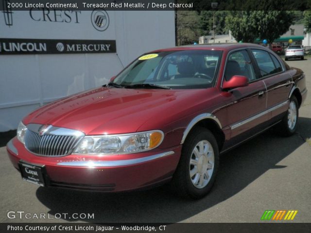 2000 Lincoln Continental  in Toreador Red Metallic