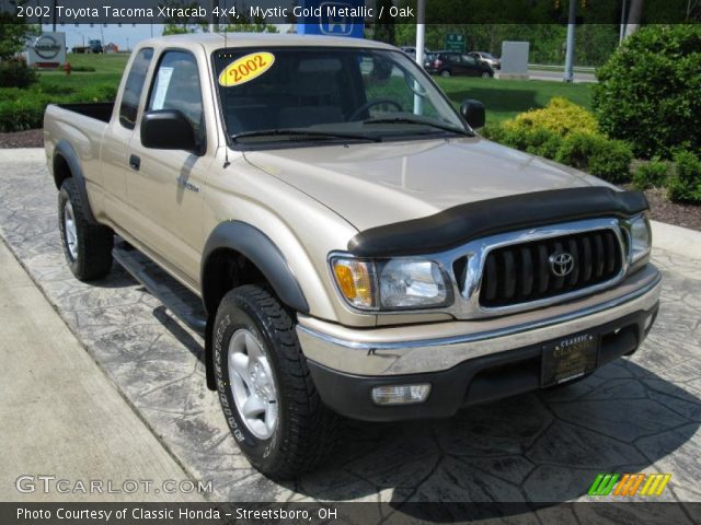 2002 Toyota Tacoma Xtracab 4x4 in Mystic Gold Metallic