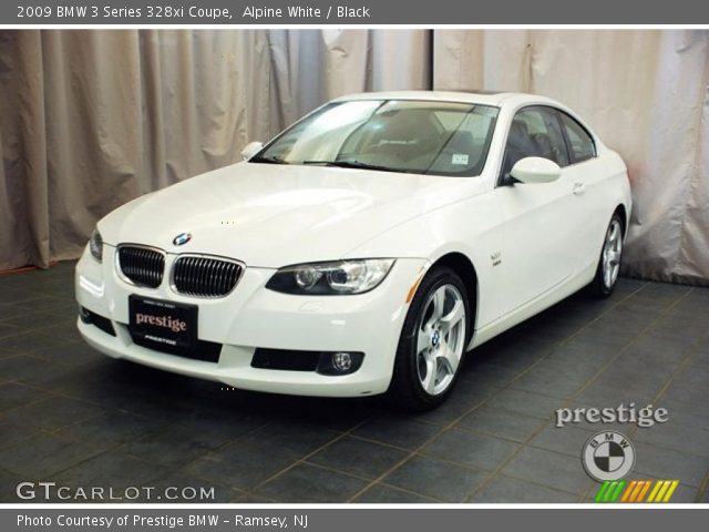 2009 BMW 3 Series 328xi Coupe in Alpine White