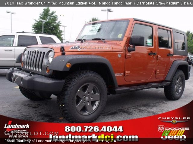 2010 Jeep Wrangler Unlimited Mountain Edition 4x4 in Mango Tango Pearl
