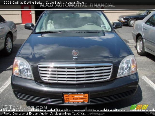 2002 Cadillac DeVille Sedan in Sable Black