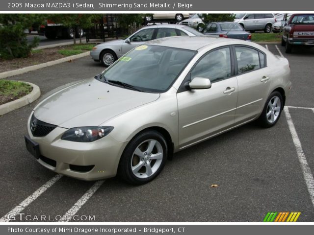 2005 Mazda MAZDA3 i Sedan in Shimmering Sand Metallic