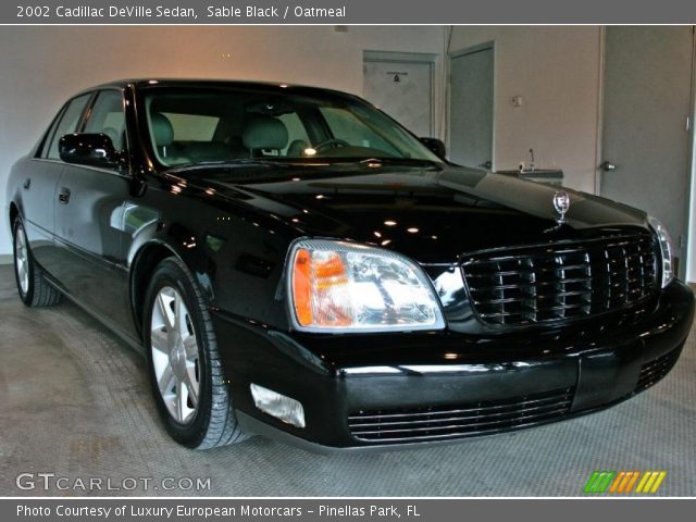 2002 Cadillac DeVille Sedan in Sable Black