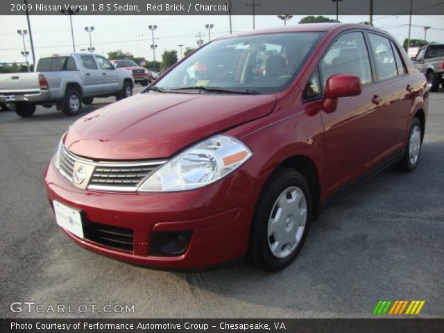 2009 Nissan Versa 1.8 S Sedan in Red Brick