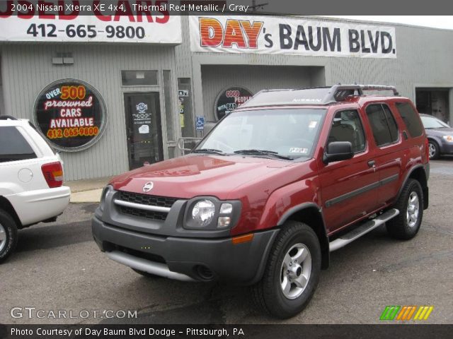 2004 Nissan Xterra XE 4x4 in Thermal Red Metallic