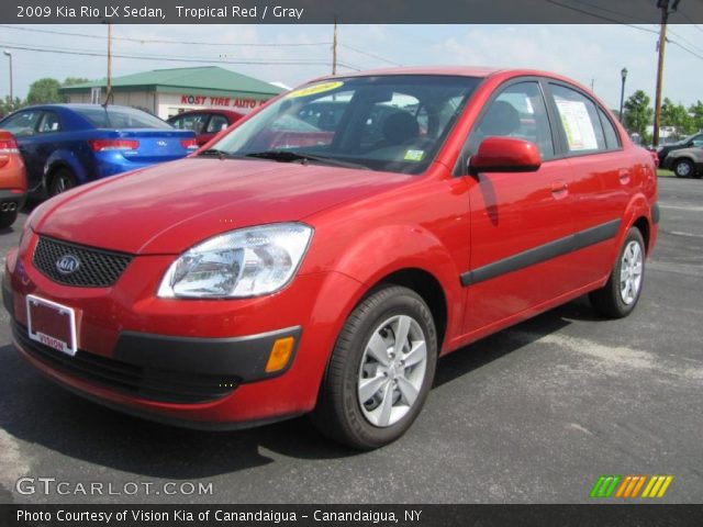 2009 Kia Rio LX Sedan in Tropical Red