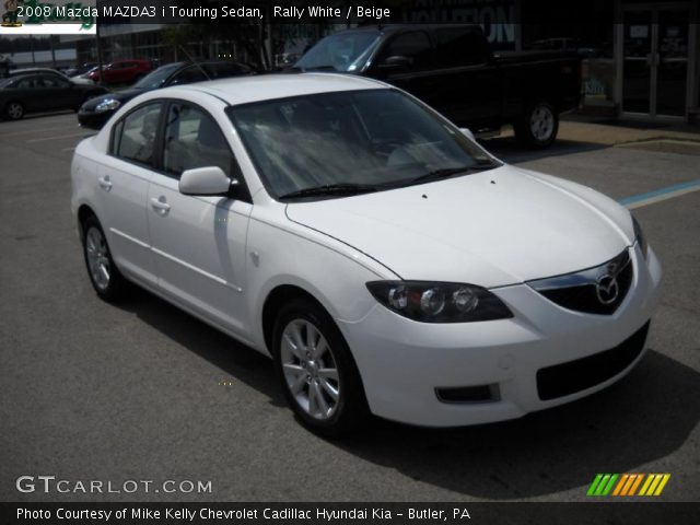 2008 Mazda MAZDA3 i Touring Sedan in Rally White