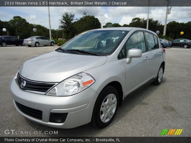 2010 Silver nissan versa hatchback #4