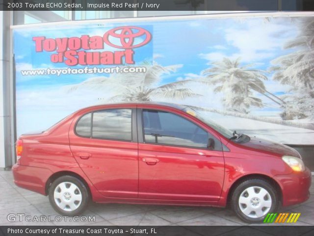 2003 Toyota ECHO Sedan in Impulse Red Pearl