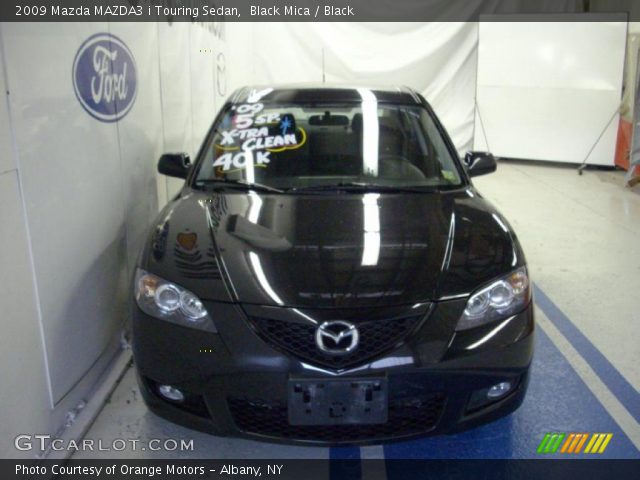 2009 Mazda MAZDA3 i Touring Sedan in Black Mica