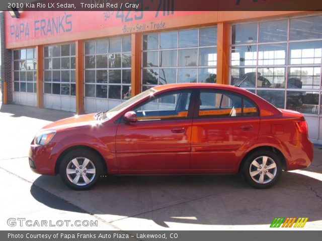 2010 Kia Rio LX Sedan in Tropical Red