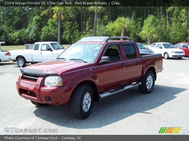 2004 Nissan Frontier SC Crew Cab 4x4 in Red Brawn Metallic