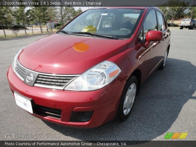 2009 Nissan Versa 1.8 S Sedan in Red Brick