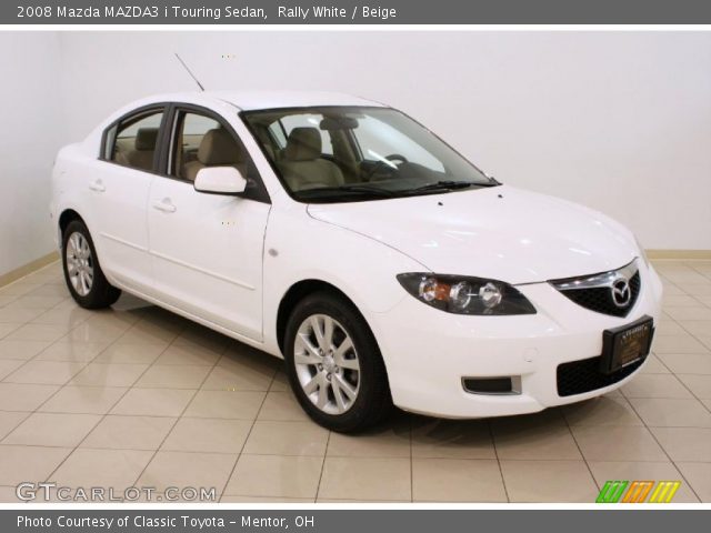 2008 Mazda MAZDA3 i Touring Sedan in Rally White