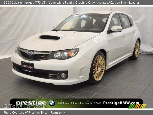 2009 Subaru Impreza WRX STi in Satin White Pearl