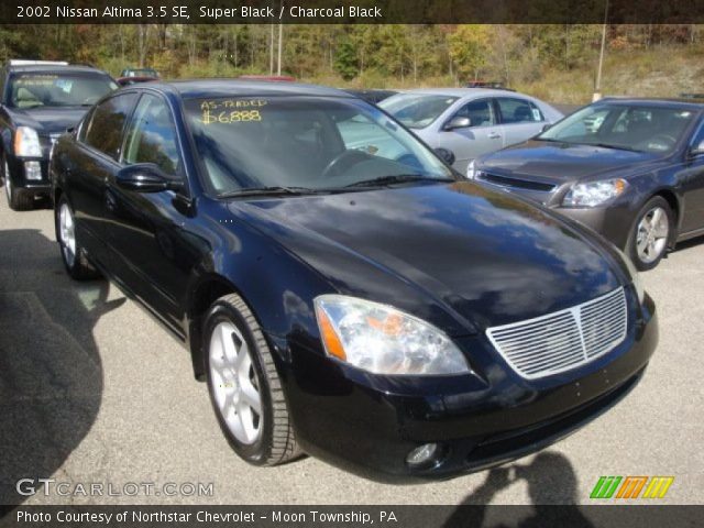 2002 Black nissan altima 3.5 se