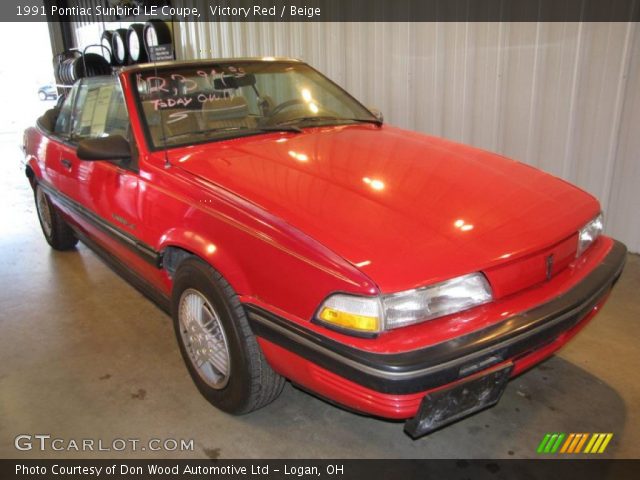 1991 Pontiac Sunbird LE Coupe in Victory Red