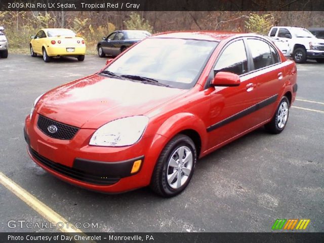 2009 Kia Rio LX Sedan in Tropical Red