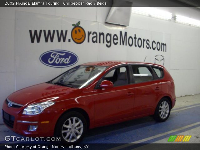 2009 Hyundai Elantra Touring in Chilipepper Red