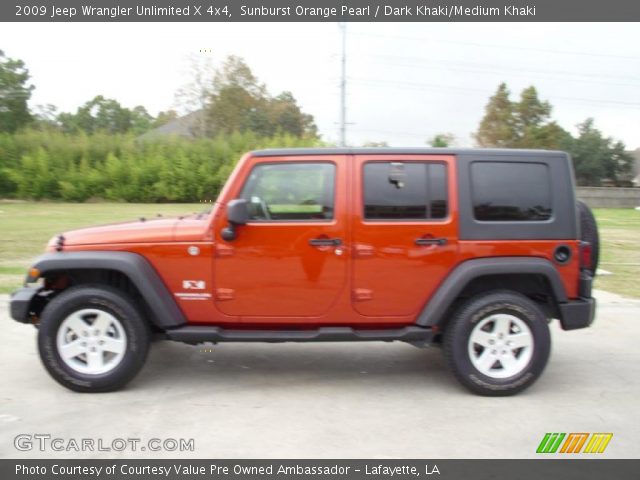 2009 Jeep Wrangler Unlimited X 4x4 in Sunburst Orange Pearl