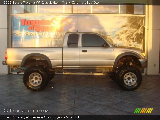 2002 Toyota Tacoma V6 Xtracab 4x4 in Mystic Gold Metallic