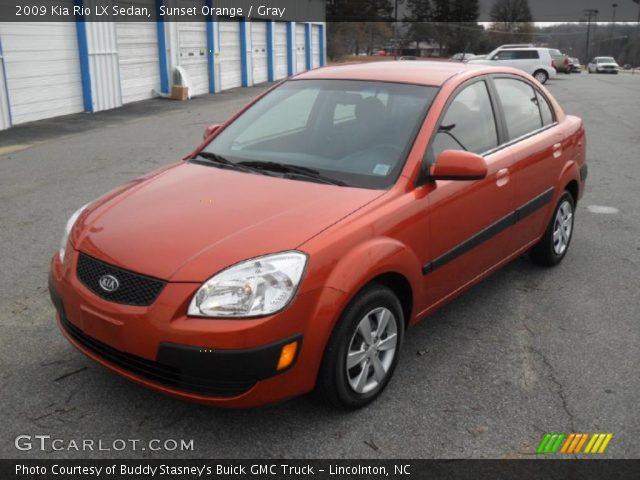 2009 Kia Rio LX Sedan in Sunset Orange