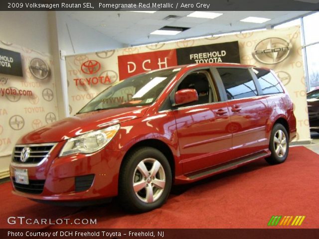 2009 Volkswagen Routan SEL in Pomegranate Red Metallic