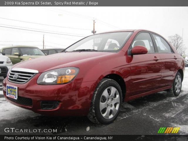 2009 Kia Spectra EX Sedan in Spicy Red Metallic