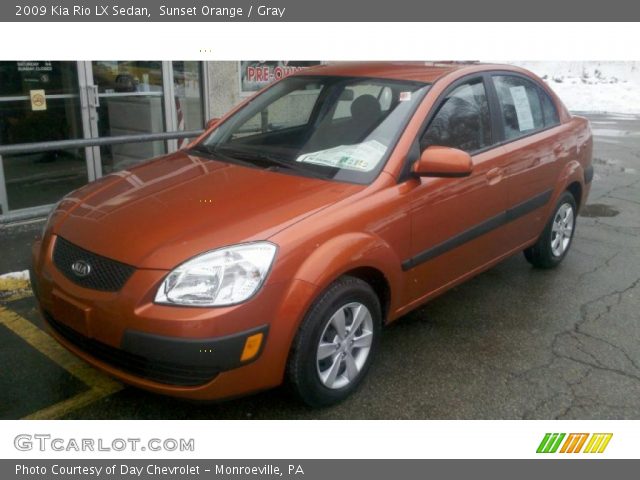 2009 Kia Rio LX Sedan in Sunset Orange