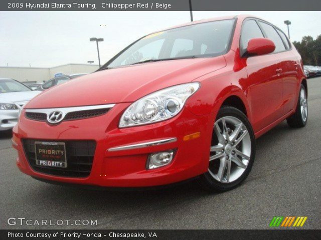 2009 Hyundai Elantra Touring in Chilipepper Red