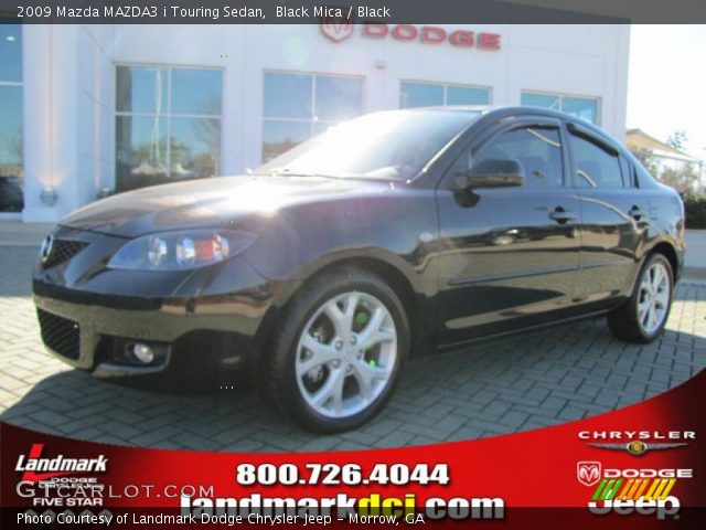 2009 Mazda MAZDA3 i Touring Sedan in Black Mica