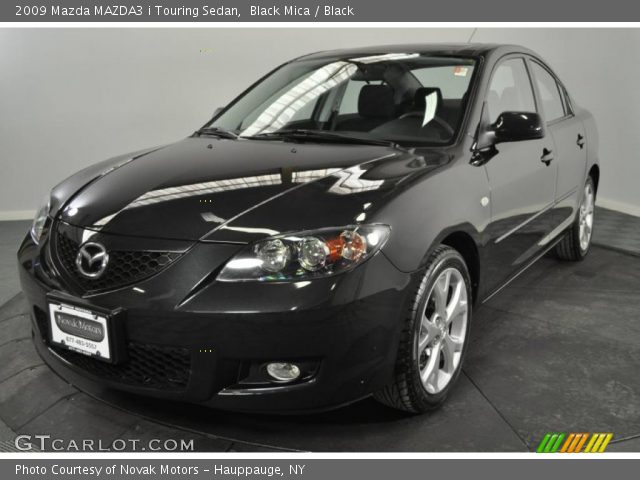 2009 Mazda MAZDA3 i Touring Sedan in Black Mica