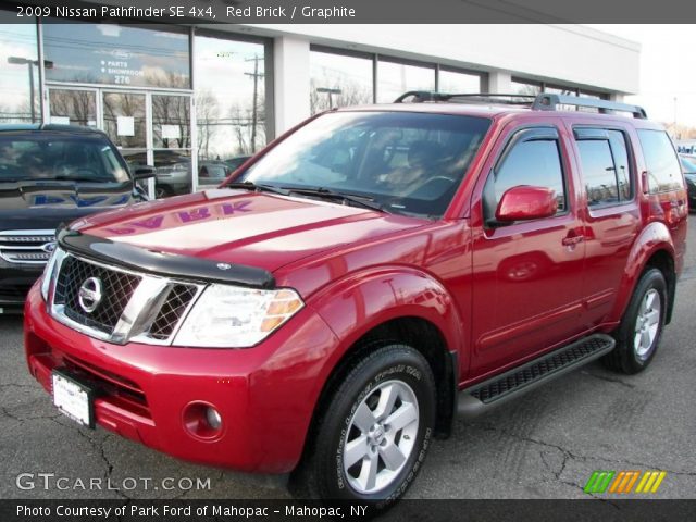 2009 Nissan Pathfinder SE 4x4 in Red Brick