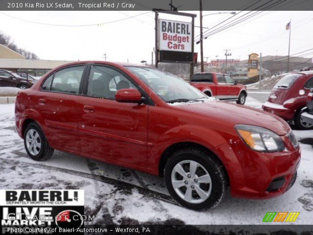 2010 Kia Rio LX Sedan in Tropical Red