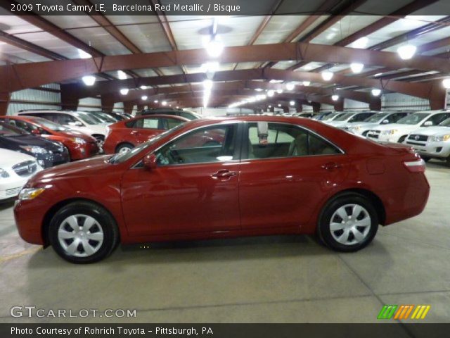 2009 Toyota Camry LE in Barcelona Red Metallic