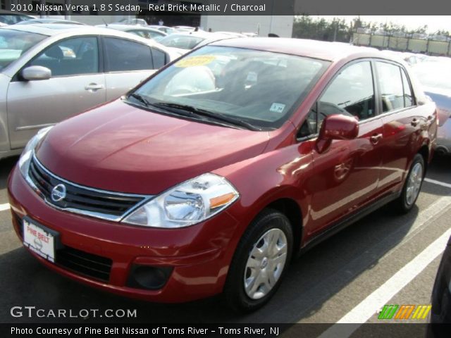 2010 Nissan Versa 1.8 S Sedan in Red Brick Metallic