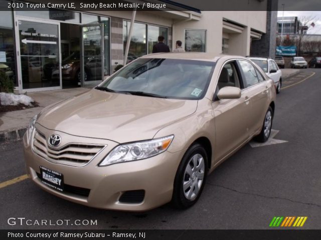 2010 Toyota Camry LE in Sandy Beach Metallic