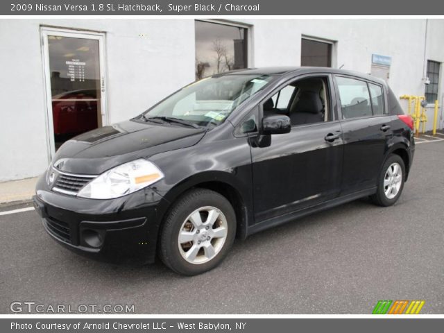 2009 Black nissan versa hatchback #10