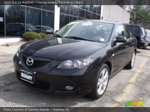 2009 Mazda MAZDA3 i Touring Sedan in Black Mica