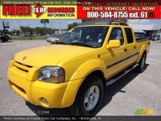 2002 Nissan Frontier SE Crew Cab 4x4 in Solar Yellow