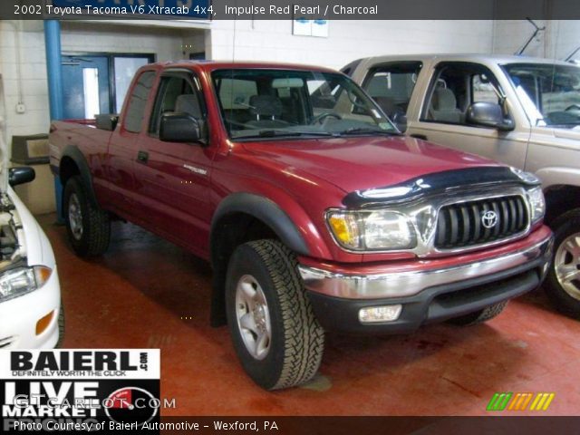 2002 Toyota Tacoma V6 Xtracab 4x4 in Impulse Red Pearl