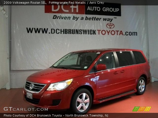 2009 Volkswagen Routan SEL in Pomegranate Red Metallic