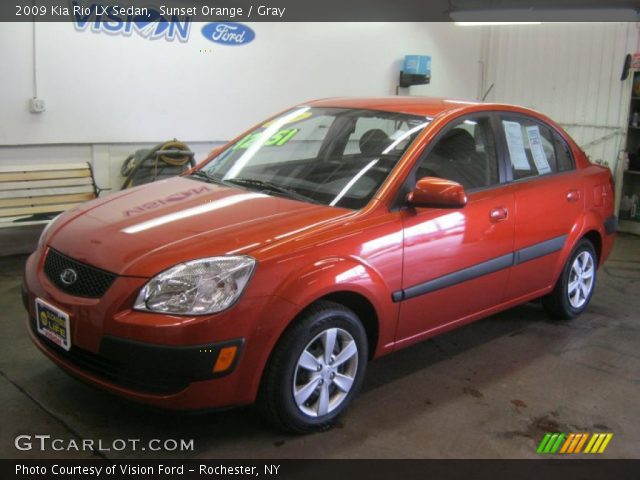 2009 Kia Rio LX Sedan in Sunset Orange